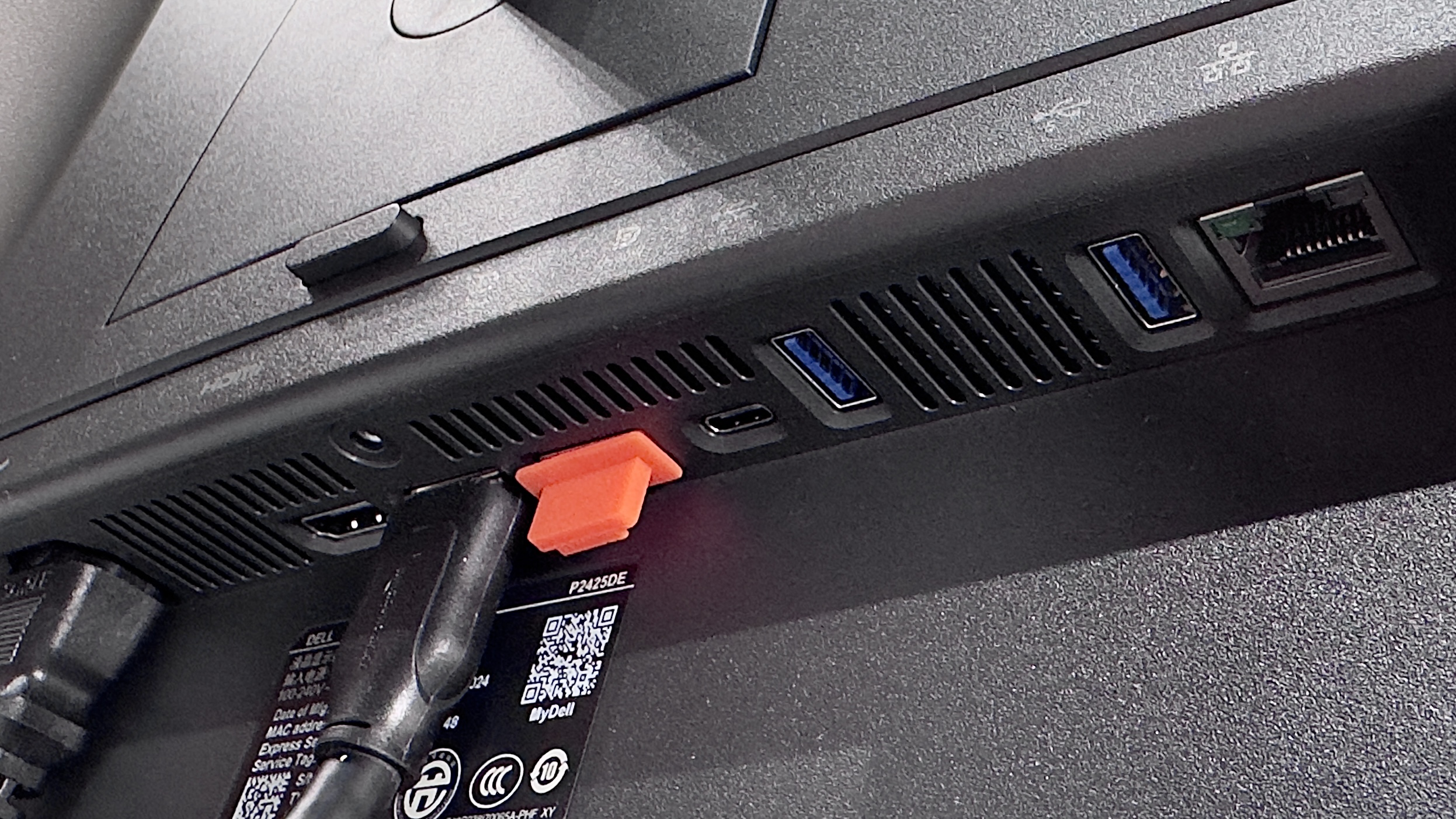 The Dell P2425DE monitor on a desk