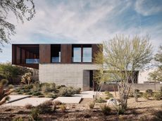 red rock house exterior of concrete shapes