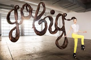 This giant typographic hair piece was built and photographed in a garage space