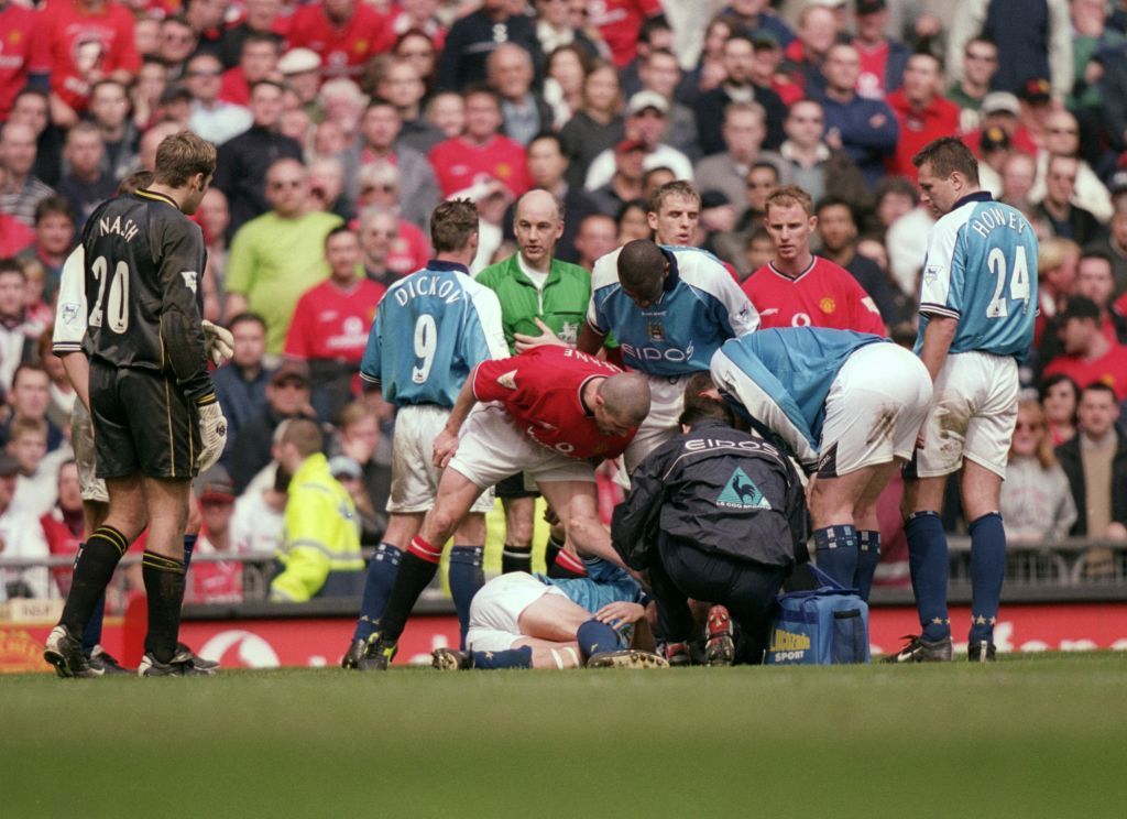 21 Apr 2001: Roy Keane of Manchester United shouts at Alf Inge Haaland of Manchester City following his red card during the FA Carling Premiership match played at Old Trafford, in Manchester, England. The match ended in a 1-1 draw. \ Mandatory Credit: Gary M Prior/Allsport