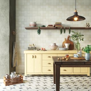 Otto Tiles' encaustic cement tiles demonstrating kitchen tile ideas in a rustic scheme with buttermilk cabinetry.