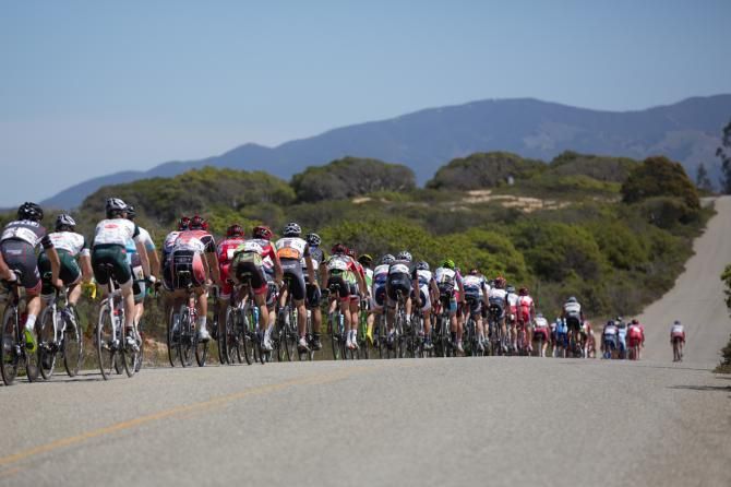 The men's peloton stretches out along the road course, an undulating loop with two steep climbs and pavement varying from wide and smooth to narrow and rough.