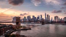 a photo of the Manhattan skyline with the Brooklyn Bridge in the foreground