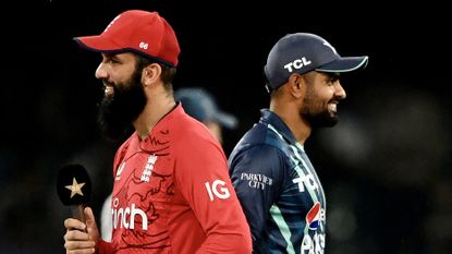 Pakistan's captain Babar Azam (R) and England's captain Moeen Ali before start of T20 international between their respective teams