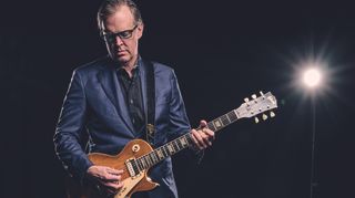 Joe Bonamassa holds his Royal Albert 1960 Gibson Les Paul