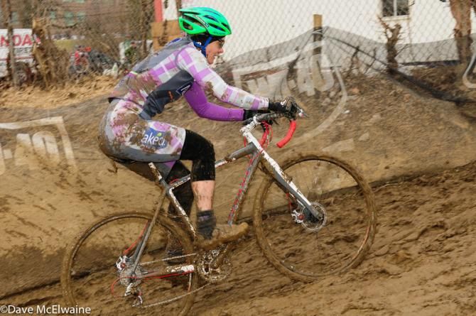 Susan Adamkovicks (USA) climbing out of a water crossing