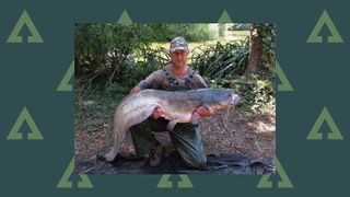 Best catfish lakes: Ian Petch holding a huge, freshly caught catfish
