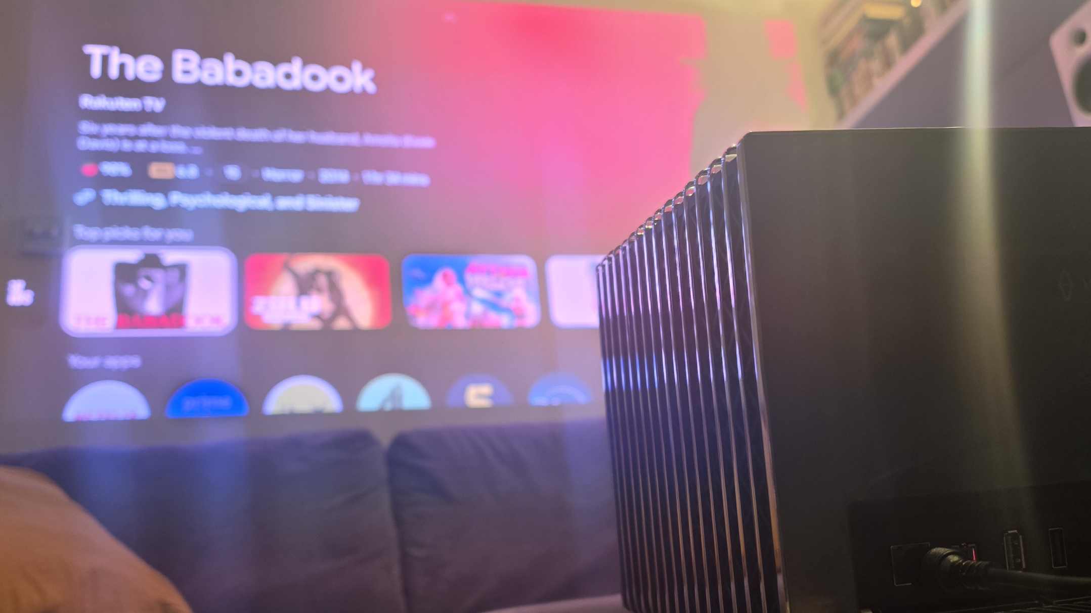 The Valerion VisionMaster 2 Pro with a library showing The Babadook.