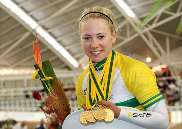 Kaarle McCulloch shows of her medal haul from the Australian Track Championships