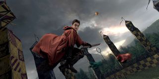 Daniel Radcliffe as Harry Potter playing Quidditch