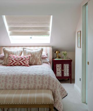 Attic bedroom with velux window