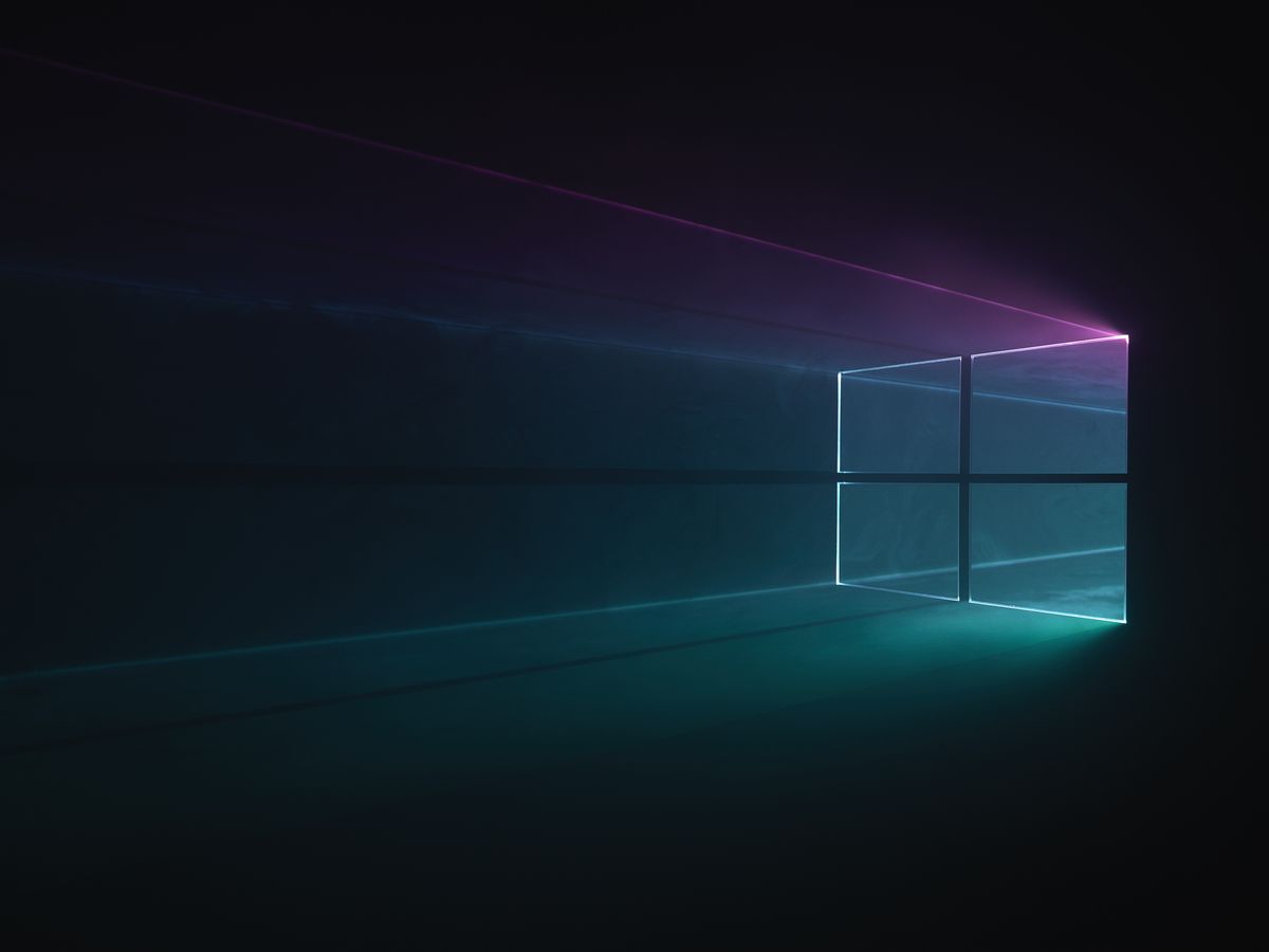 WIP versions of Windows 10 desktop background with light being filtered through a physical windows 10 logo