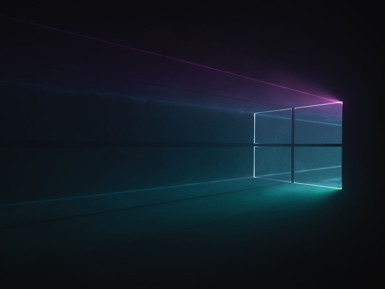 WIP versions of Windows 10 desktop background with light being filtered through a physical windows 10 logo