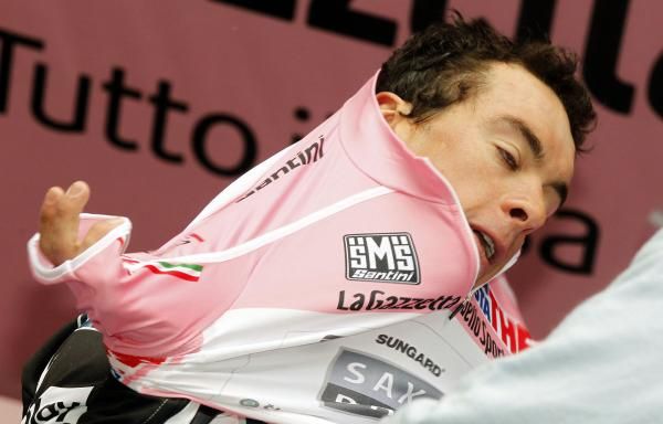 Richie Porte pulls on the pink jersey