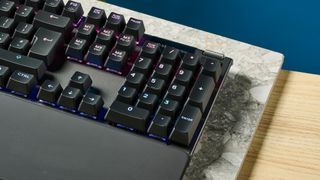 A black SteelSeries Apex Pro wired gaming keyboard