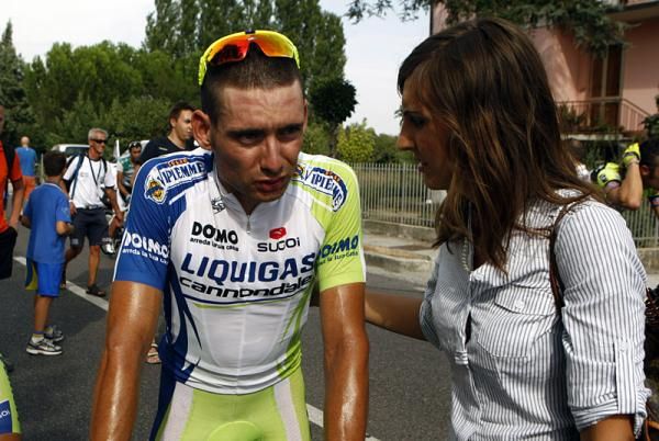 Runner-up Simone Ponzi (Liquigas-Cannondale) is consoled at the finish.