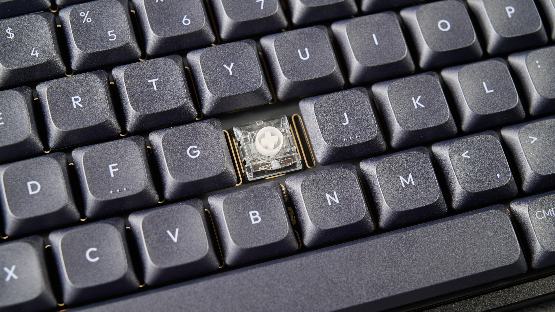A black IQUNIX MQ80 mechanical keyboard