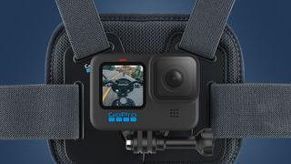 A GoPro Hero 10 Black mounted on a chest mount