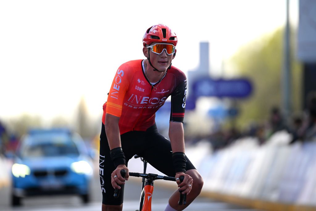 WAREGEM BELGIUM MARCH 27 Joshua Tarling of The United Kingdom and Team INEOS Grenadiers crosses the finish line during the 78th Dwars Door Vlaanderen 2024 Mens Elite a 1886km one day race from Roeselare to Waregem UCIWT on March 27 2024 in Waregem Belgium Photo by Tim de WaeleGetty Images