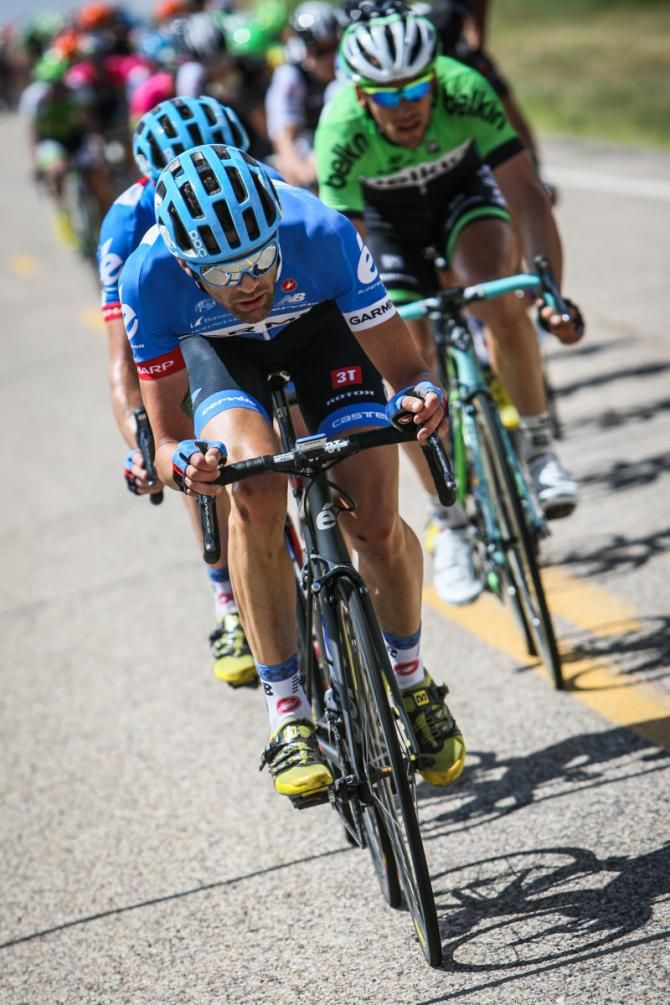 Phil Gaimon (Garmin) helps take up the chase