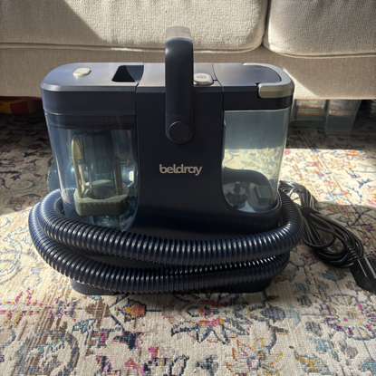 Beldray Spot Lift Pro Carpet Cleaner front view, positioned on patterned rug