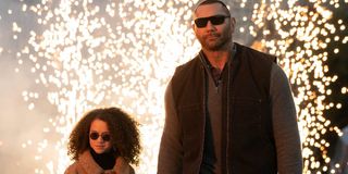 My Spy Chloe Coleman and Dave Bautista walk away from an explosion