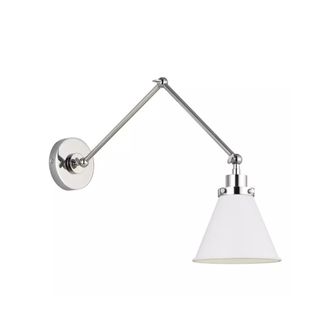 A silver wall sconce with a bent base and a white cone lampshade
