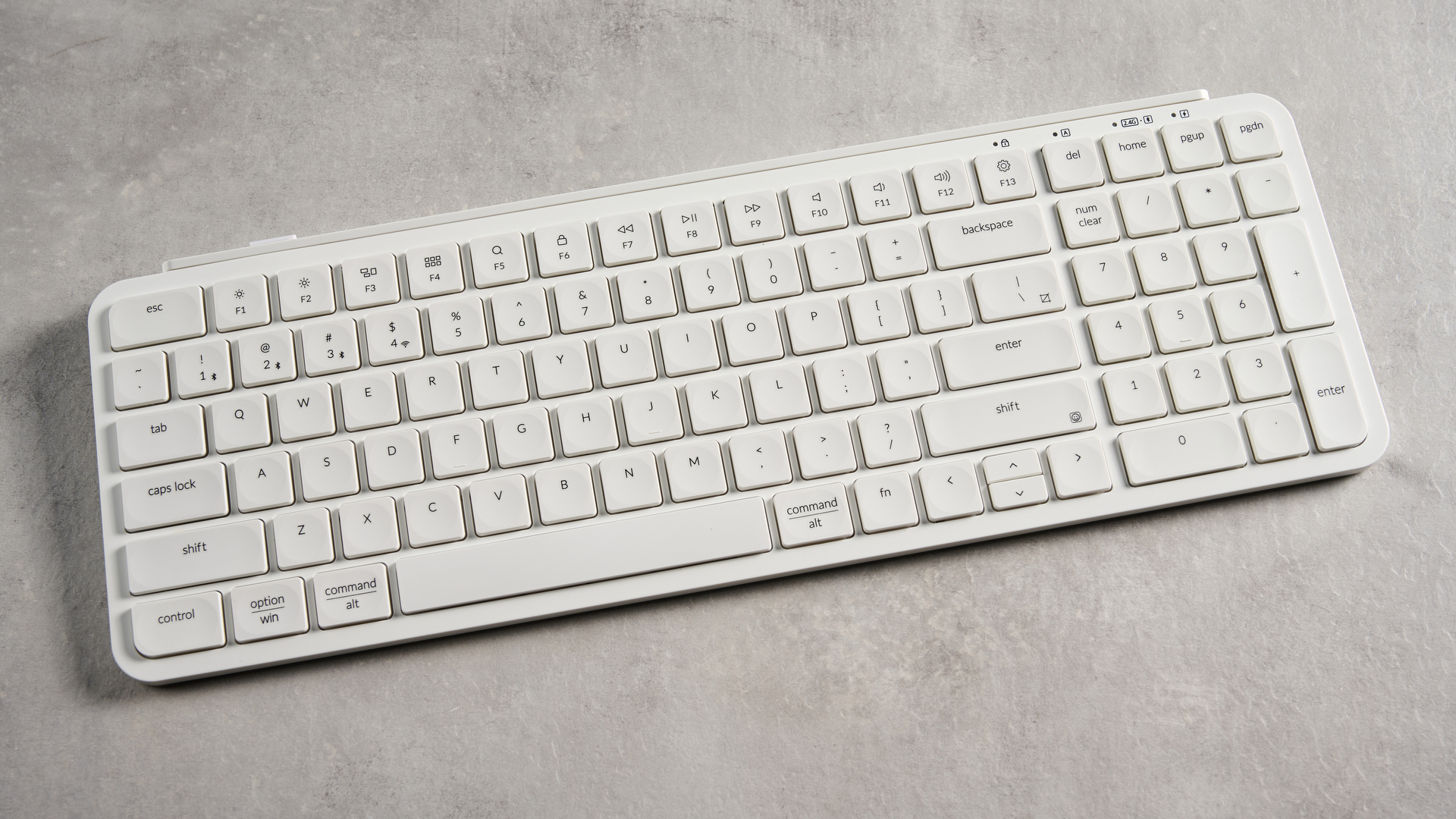 Keychron B2 Pro ultra-slim low profile keyboard in white photographed on a grey background. 