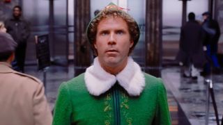 Buddy The Elf arriving in the lobby of a corporate office. 