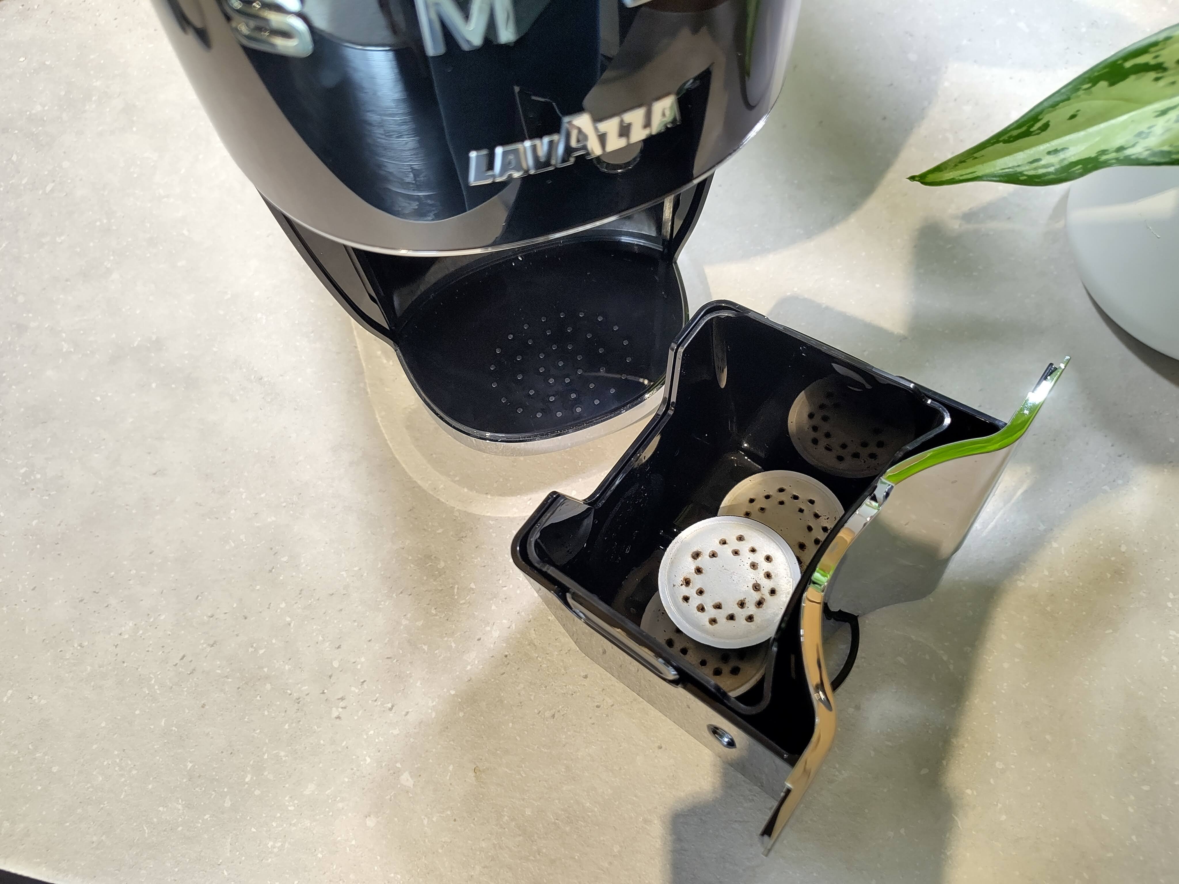Used pod bin removed from Lavazza A Modo Mio Smeg coffee maker