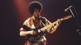 Leo Nocentelli performs live on stage with American funk group the Meters in London in 1976