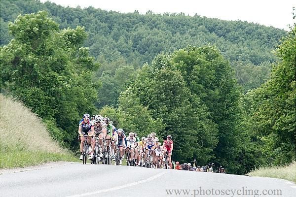 The peloton approaches the top of a climb in northern France