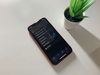 Eve For Homekit App 4.3 Update displayed on an iPhone on a white desk