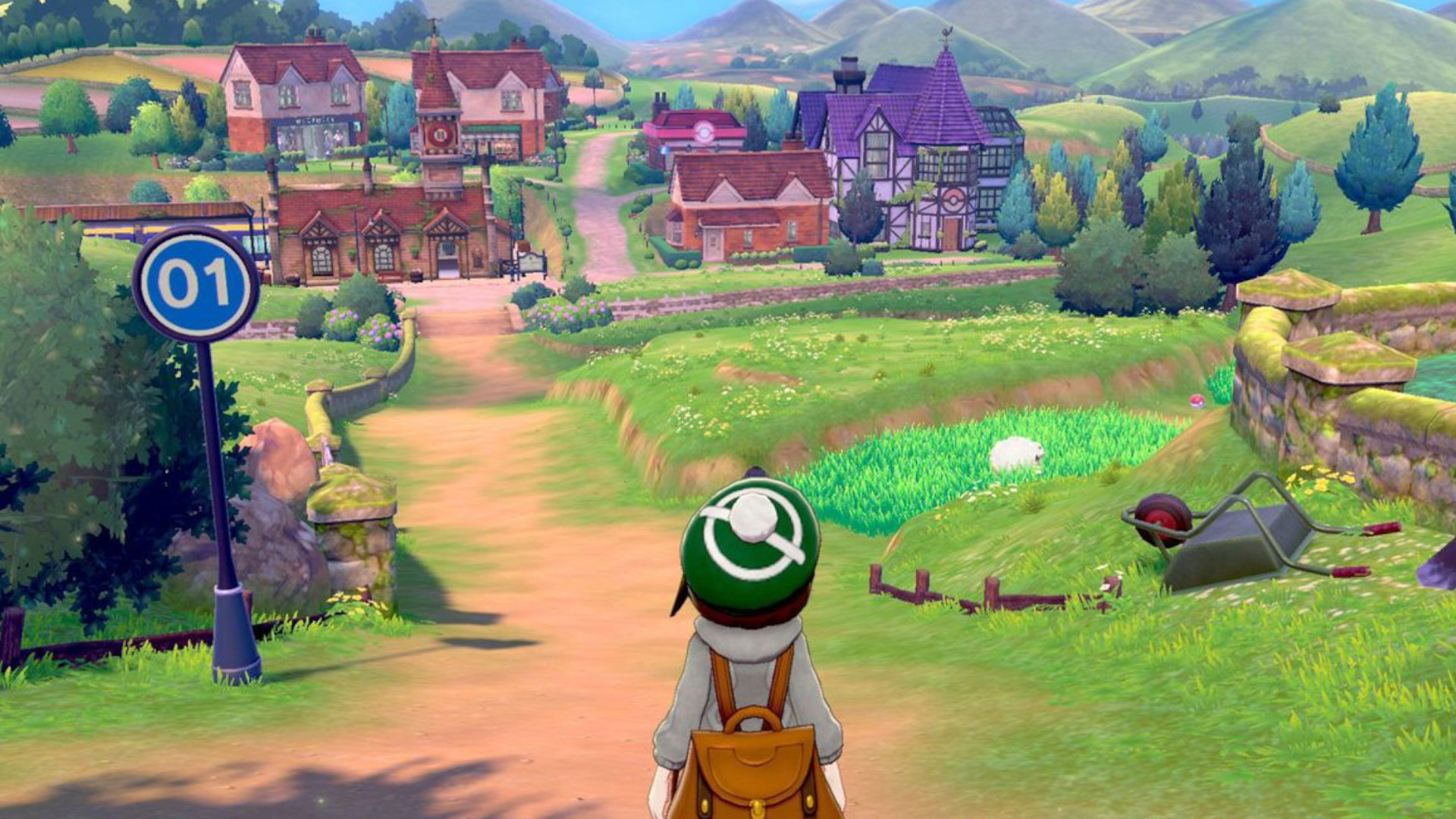 A trainer walking down route 1 after exiting their home in the RPG Pokemon Sword and Shield.