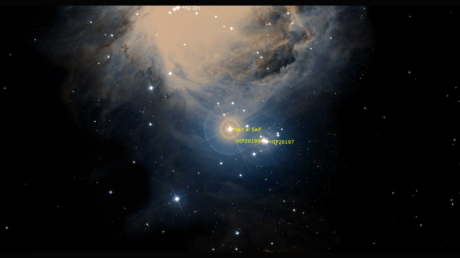 A close up of the Orion nebula in space, with the bottom half of it at the top of the image, a yellow label next to a bright star at the bottom of the nebula which sits in the center of the image