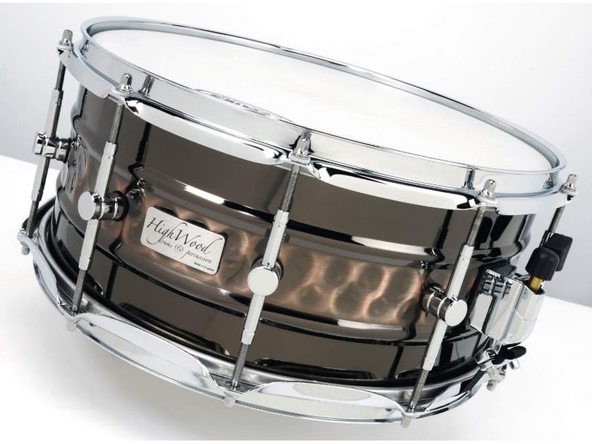 The hand-hammered shells, despite being finished in black nickel plate, boast a copper-like sheen