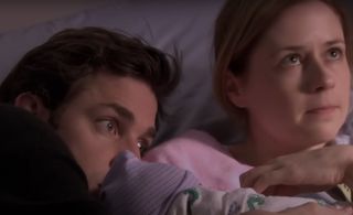 Jim and Pam with their new baby in The Office