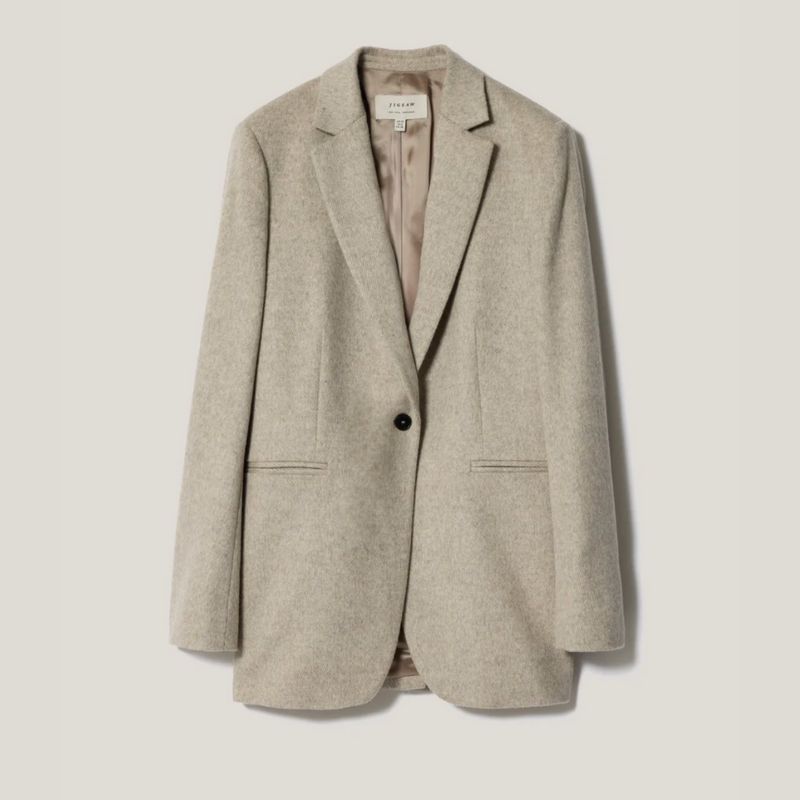 A cream blazer by Jigsaw