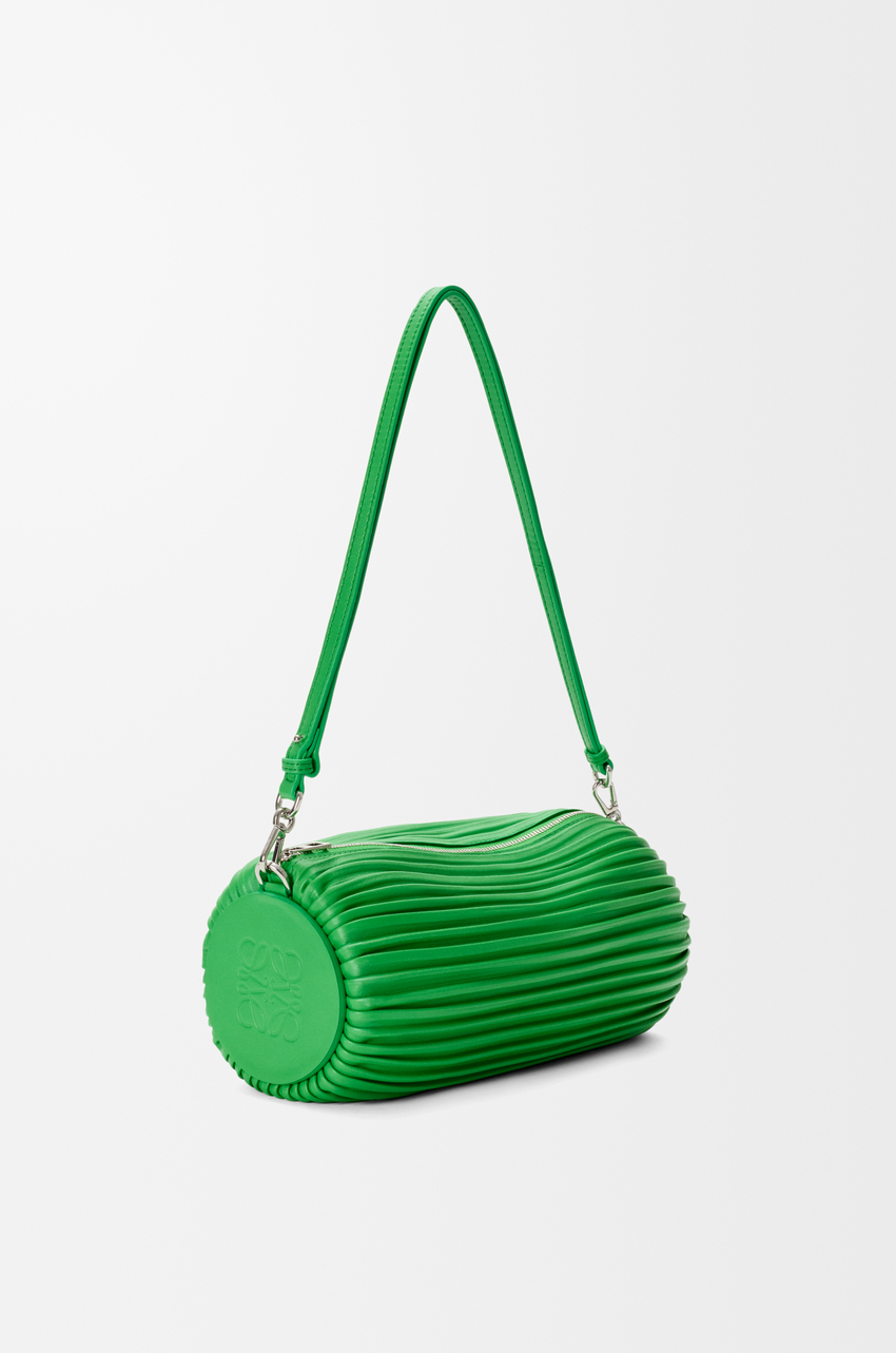 A green Loewe shoulder bag.