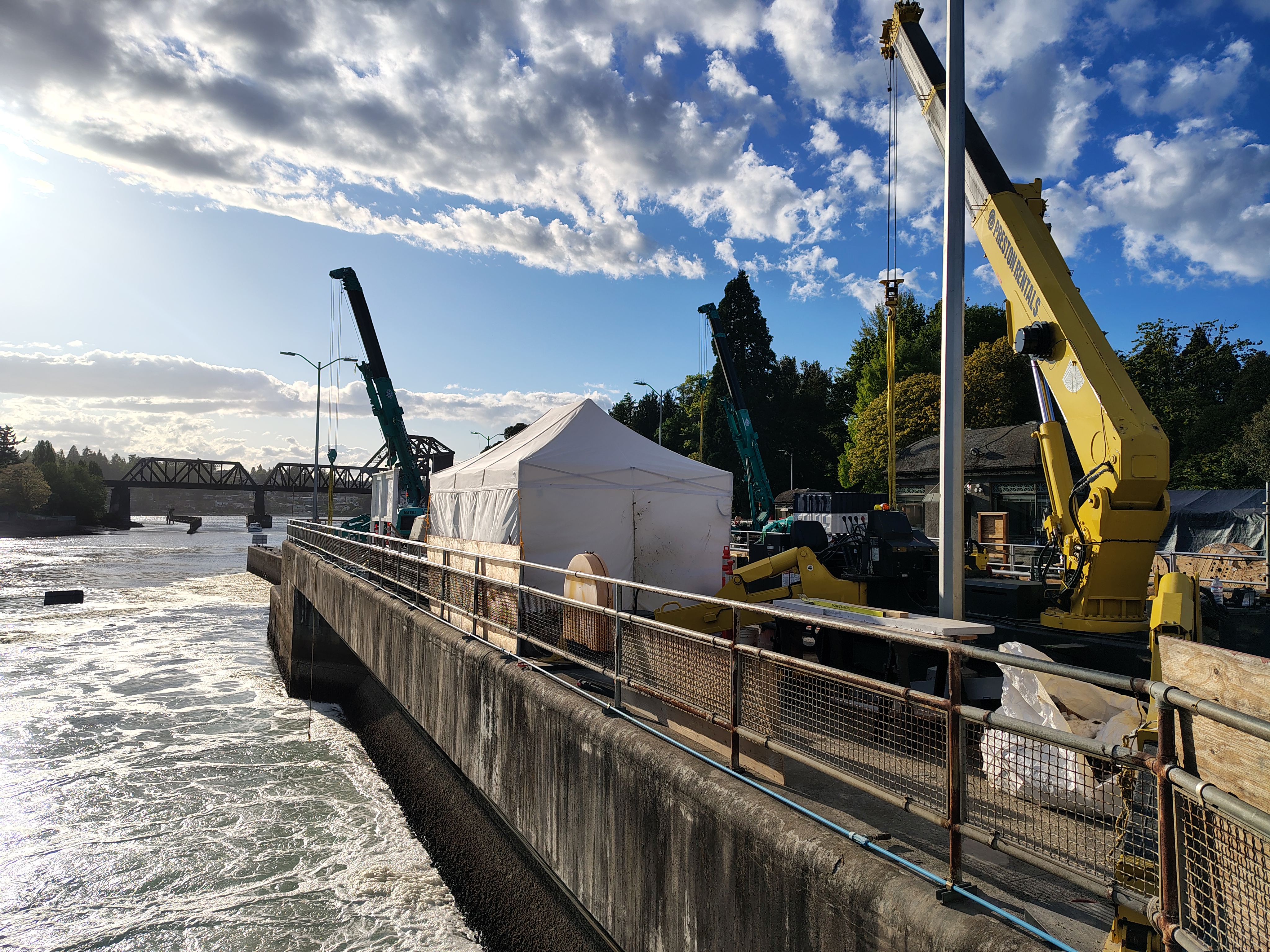 Construction machinery next to a body of water