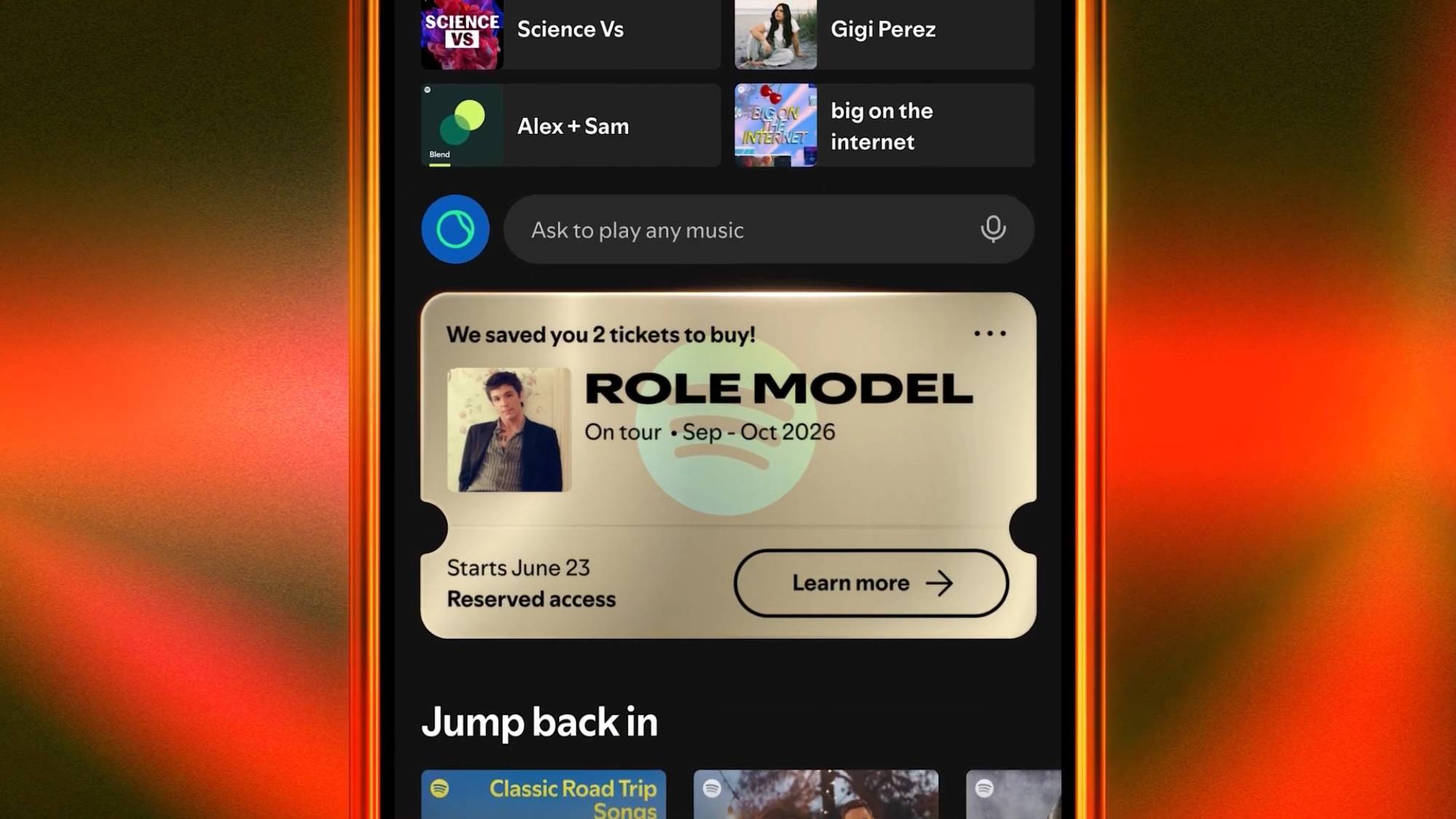 A smartphone with Spotify's Reserved tool showing tickets for ROLE MODEL
