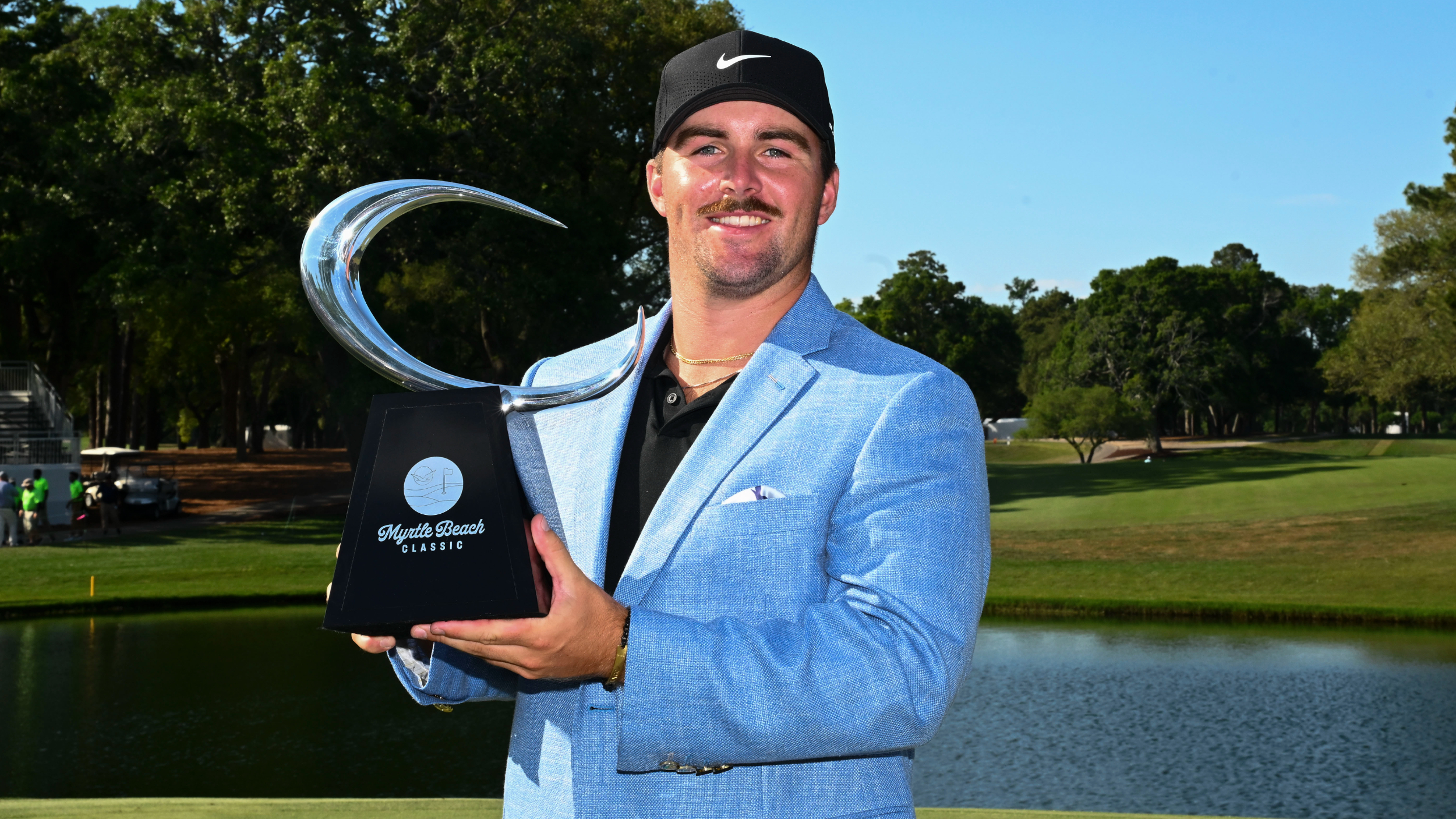 Chris Gotterup with the Myrtle Beach Classic trophy 