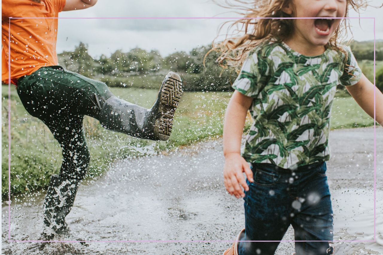 Children playing in the rain