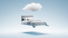 Best bed floating on blue background with cloud