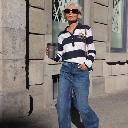 infleuncer wearing a rugby top and flared jeans