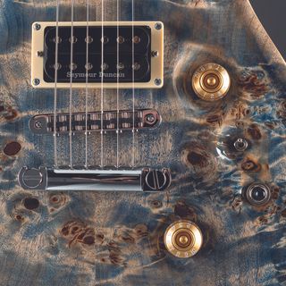 A detail photo of a Fame Forum IV Modern 20th Anniversary in Burl Stonewashed Blue