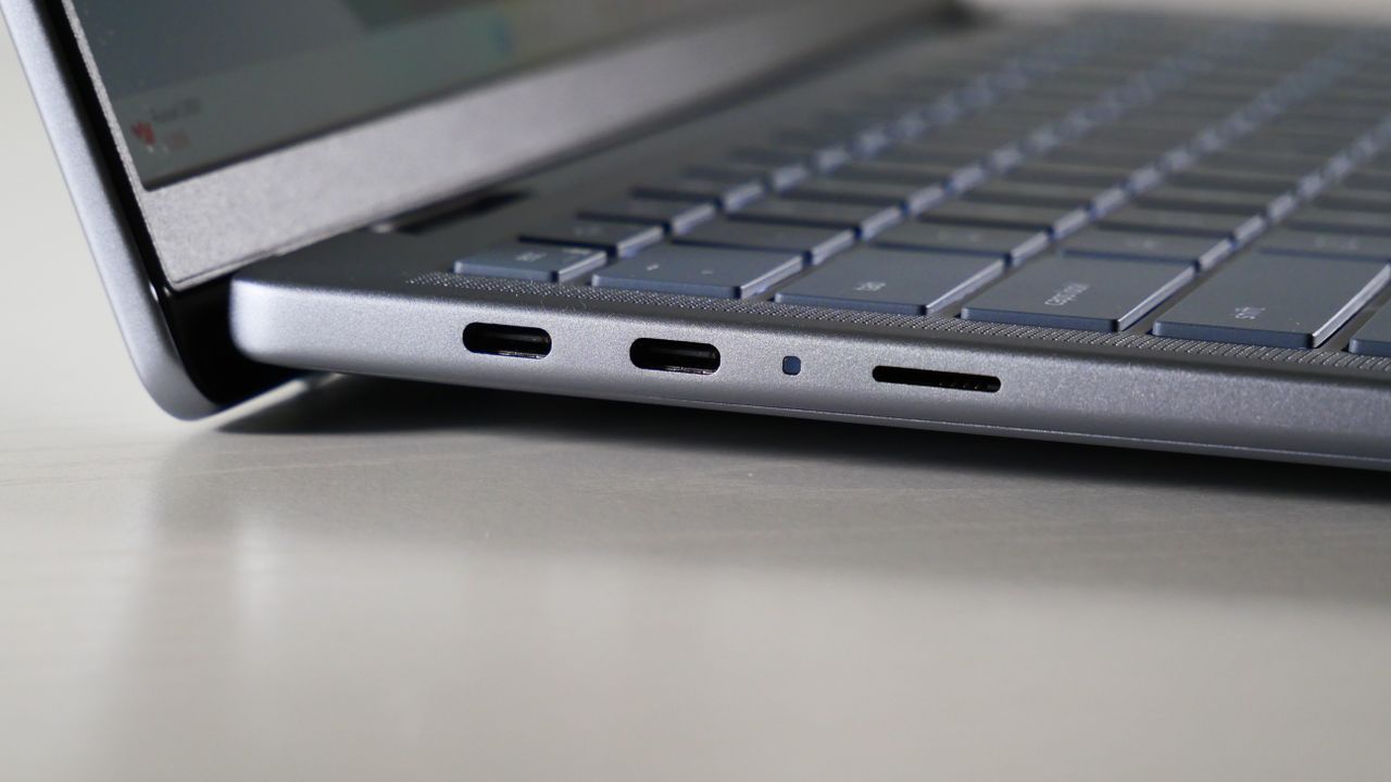 Close up of the left ports on a Dell Inspiron 14 Plus 7441 (Snapdragon X Plus) on a white table.
