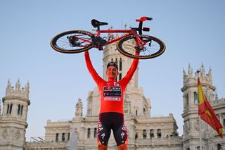 MADRID SPAIN SEPTEMBER 08 Primoz Roglic of Slovenia and Team Red Bull Bora hansgrohe celebrates at podium as Red Leader Jersey winner during the La Vuelta 79th Tour of Spain 2024 Stage 21 a 246km individual time trial stage from Madrid to Madrid UCIWT on September 08 2024 in Madrid Spain Photo by Dario BelingheriGetty Images