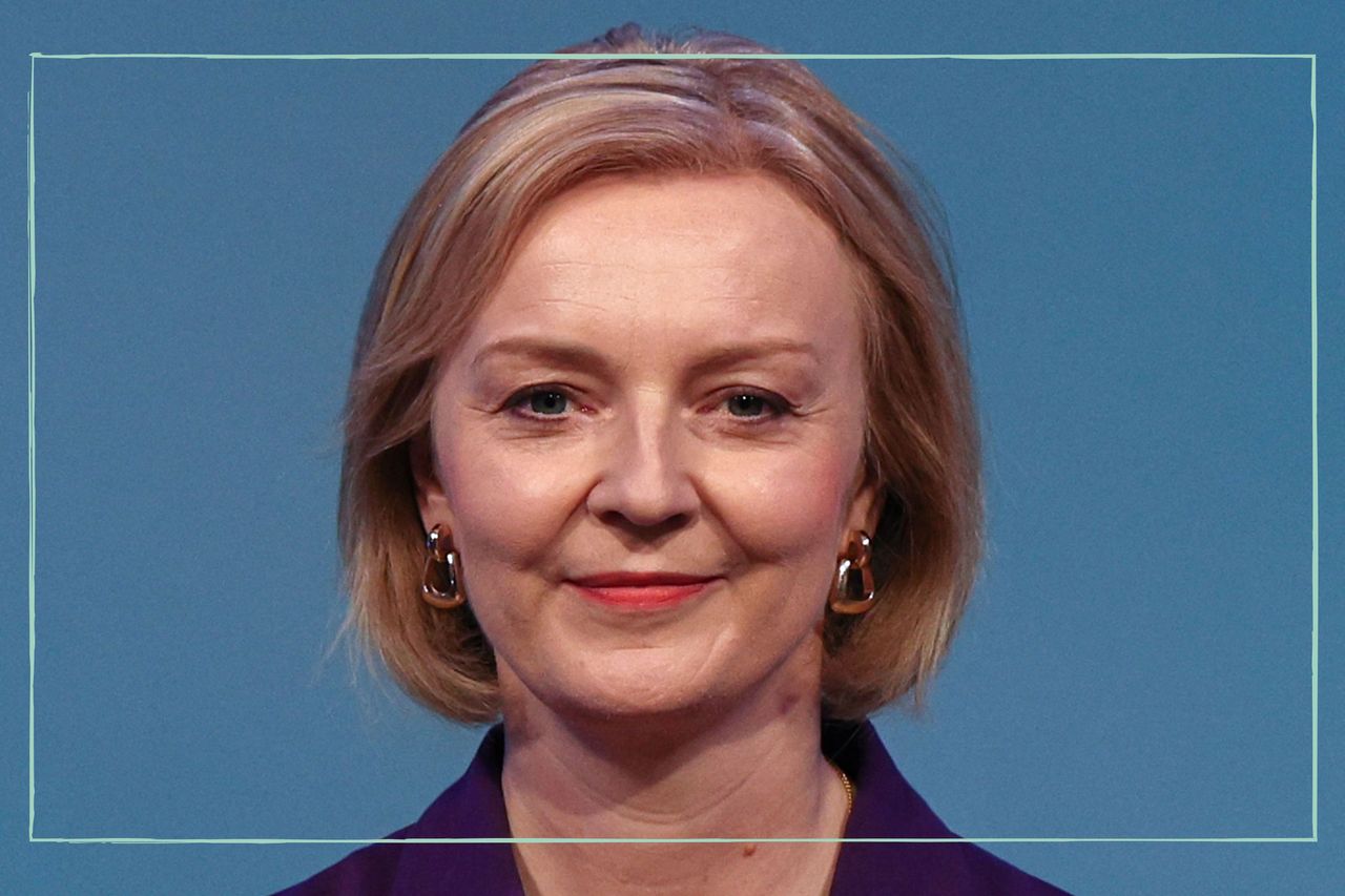 An extreme close up of Liz Truss&#039;s face smiling