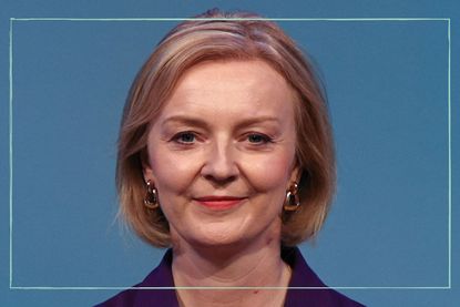 An extreme close up of Liz Truss's face smiling